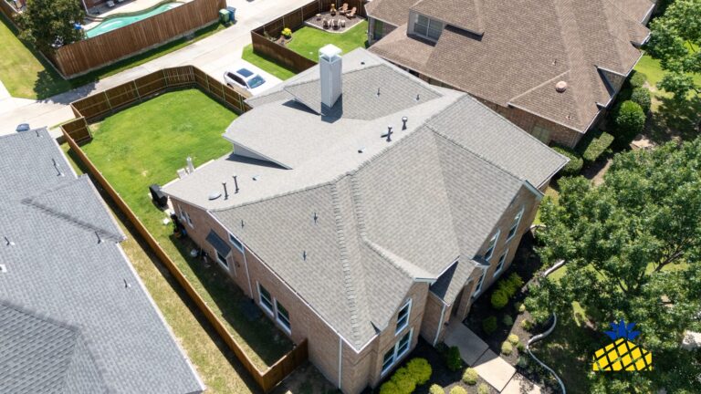 Aerial view of a Lewisville, TX home showing the roof edges and gutter lines